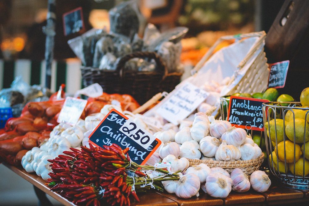 garlic for sale at a market stall