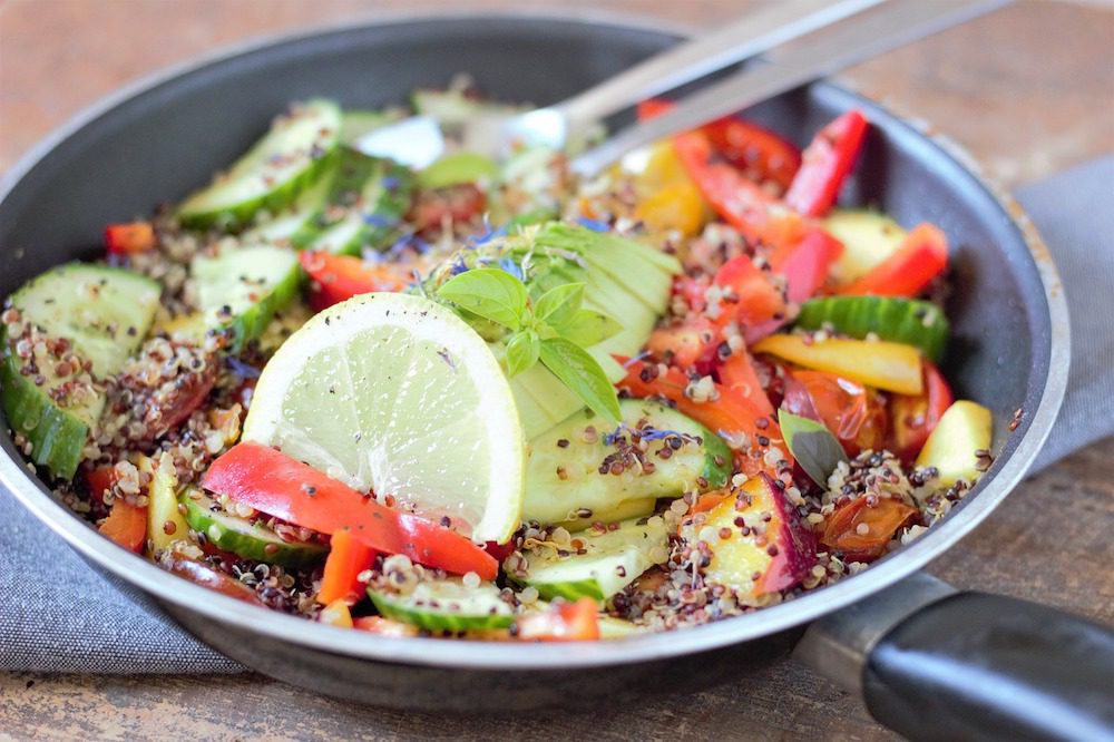 A quinoa bowl and salad