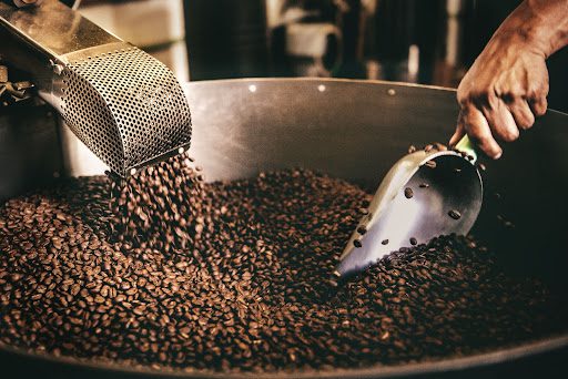 Coffee beans in a roasting machine 
