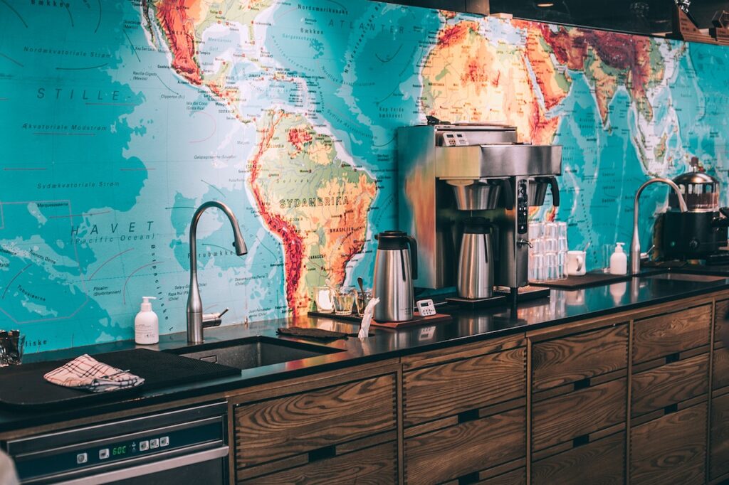 Coffee machine in front of map