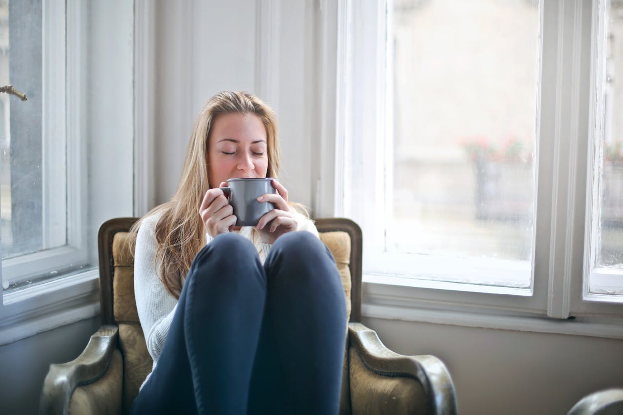 Woman relaxing with a cup of coffee