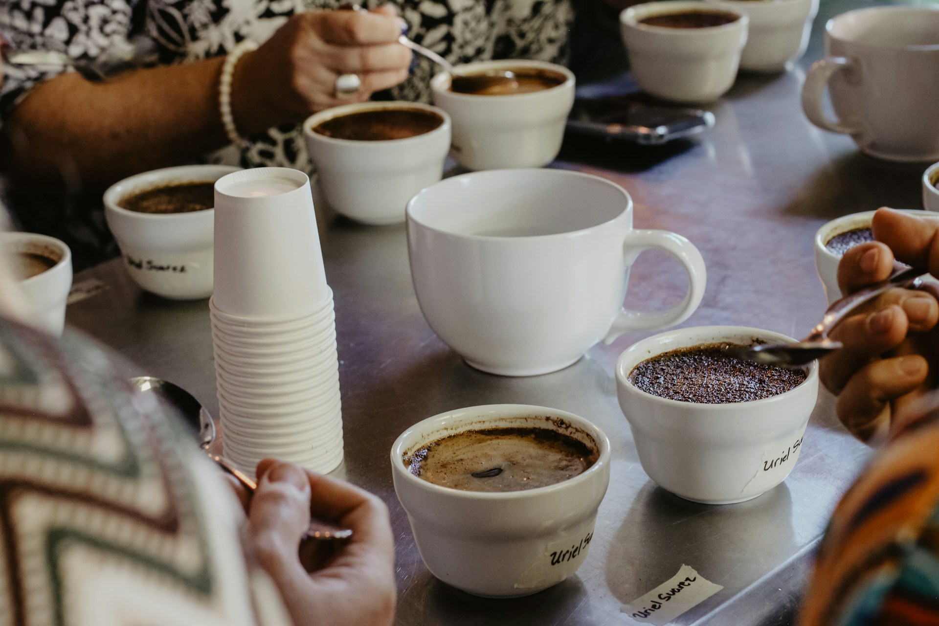 A group testing different cups of coffee 