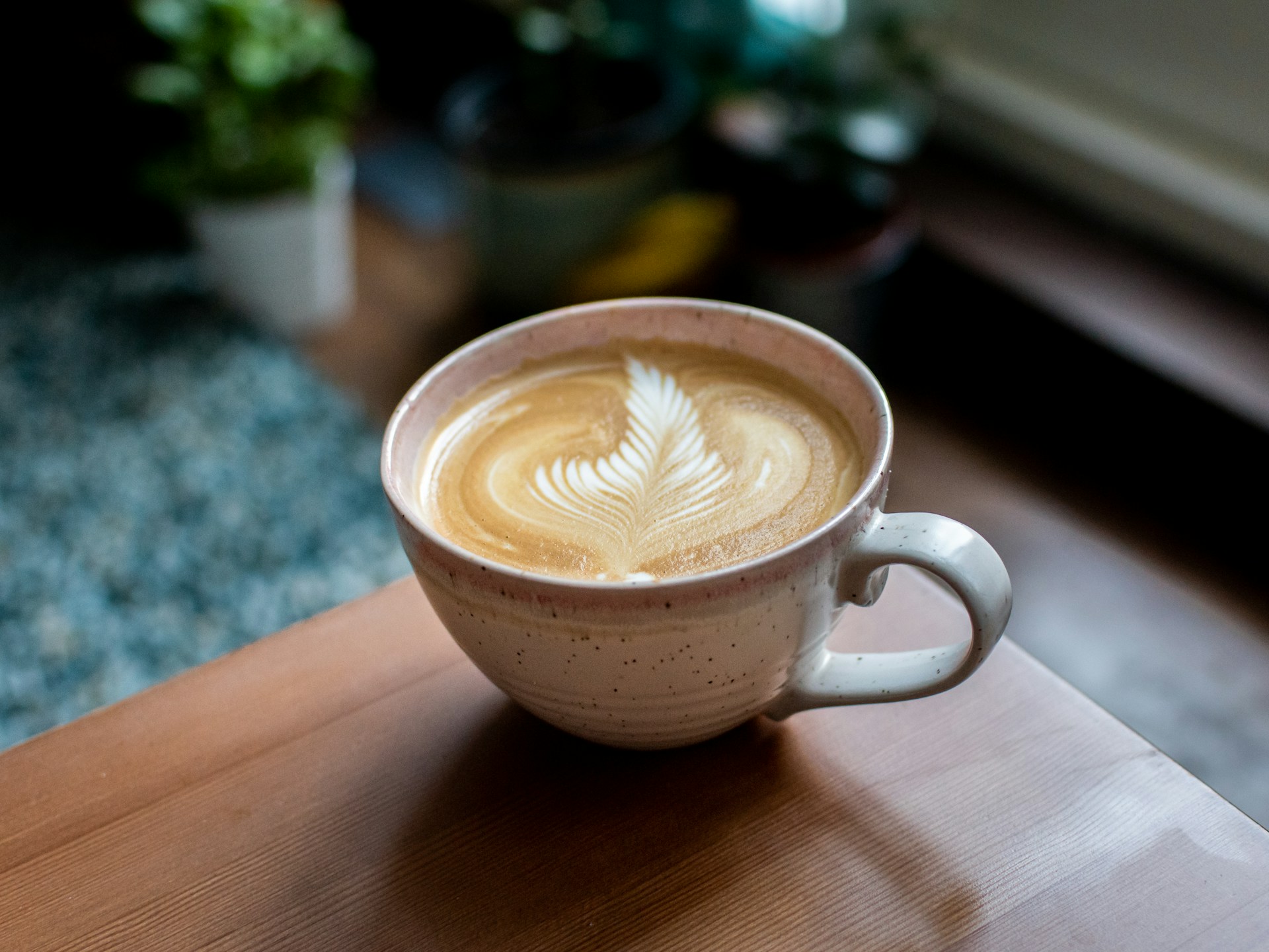 Flat white in pink mug