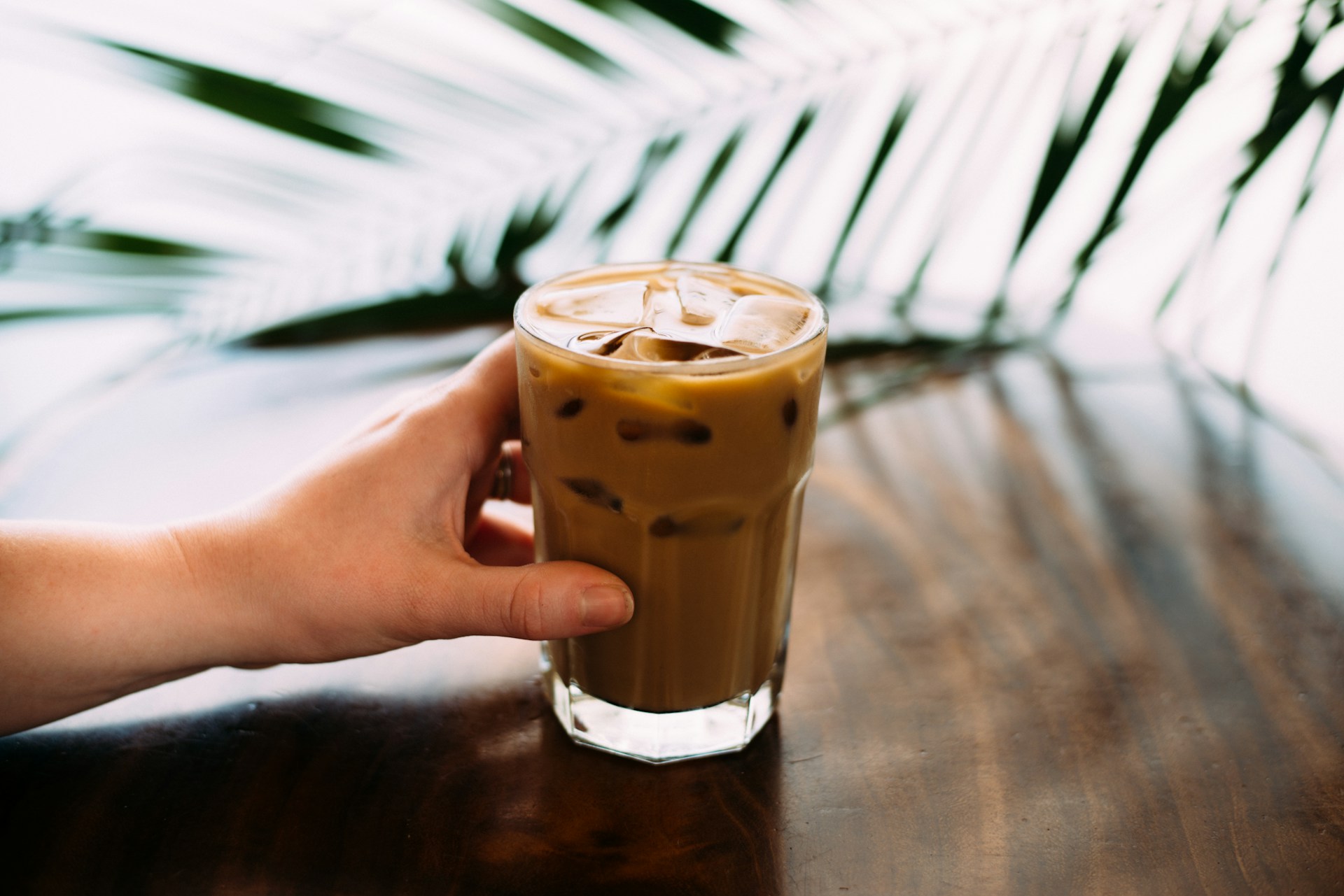 Glass of milky iced coffee